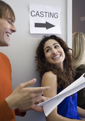 Man and woman in line for casting